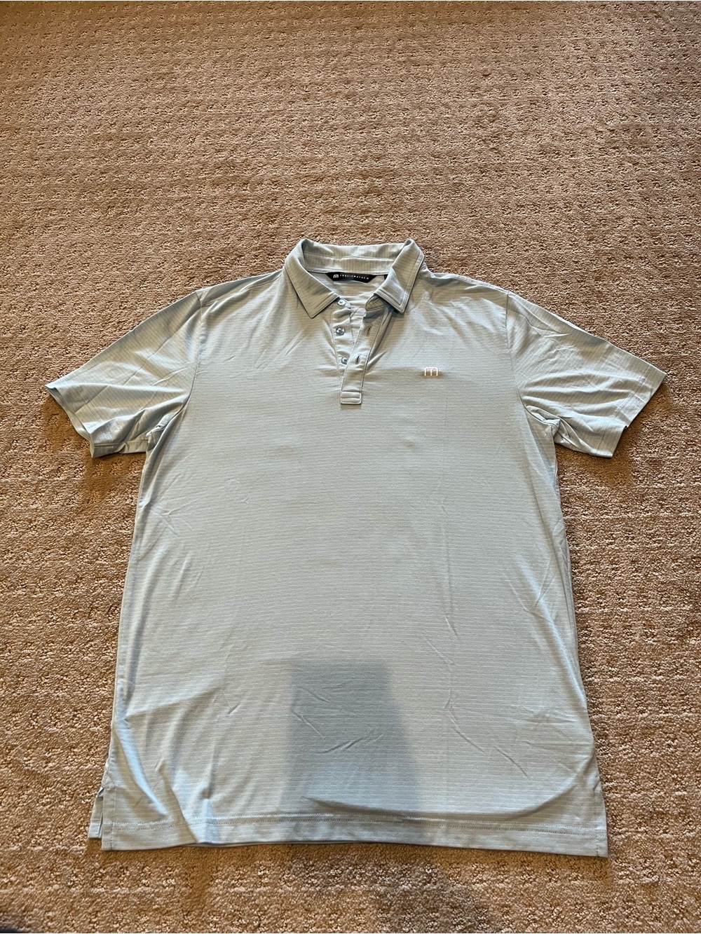 Travis Mathew Light Blue Striped Performance Polo